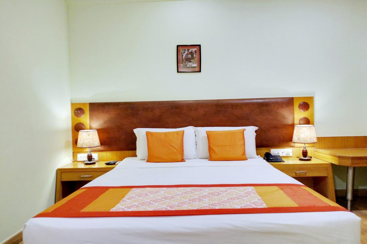 Oyo 6110 Thalassa Suites Bangalore Bagian luar foto