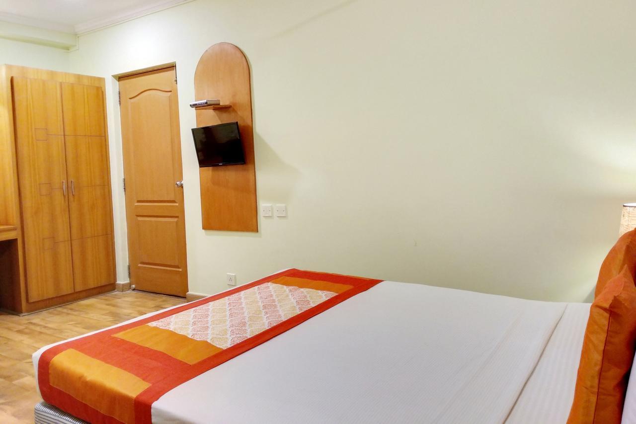Oyo 6110 Thalassa Suites Bangalore Bagian luar foto